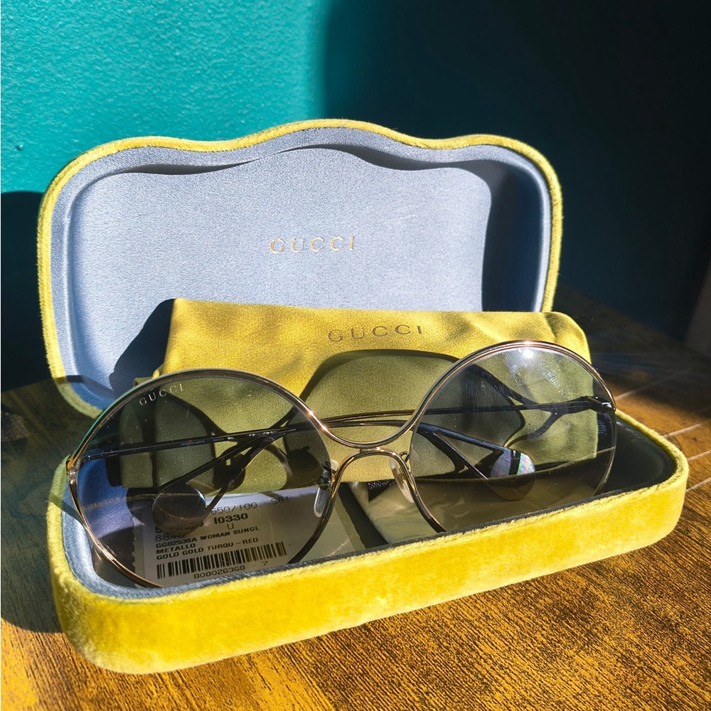 Gucci Black and Gold Sunglasses